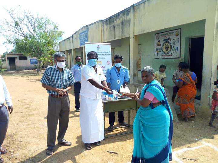 Panchayat president distributing mask
